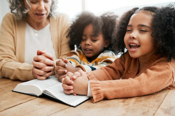 Bible, worship or grandmother praying with kids or siblings for prayer, support or hope in Christia